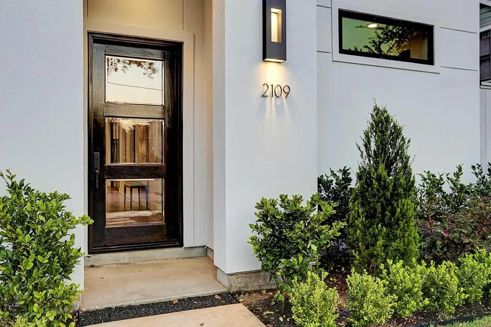 Front entry and glass garage